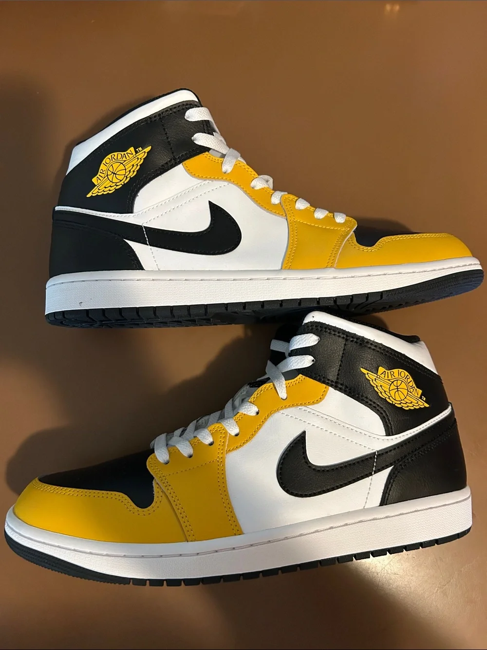 Jordan Men’s High-Top Sneakers in Black/Yellow/White